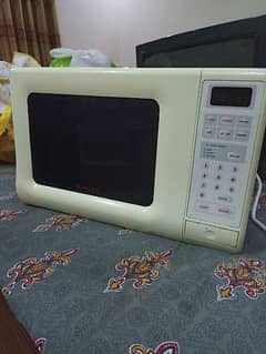 Singer Microwave Oven (Contact: 0346-6817870)