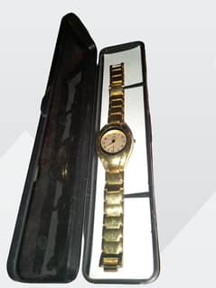 golden colour watch