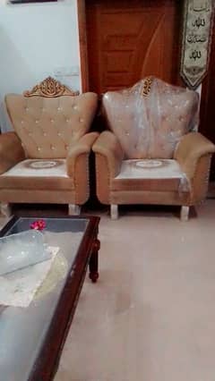 a beautiful sofa set with embroidery seats n velvet cushions