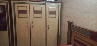 three door cupboard