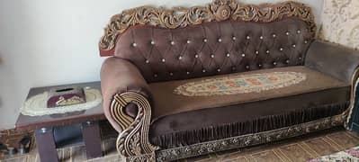 Brown sofa set with coffee table