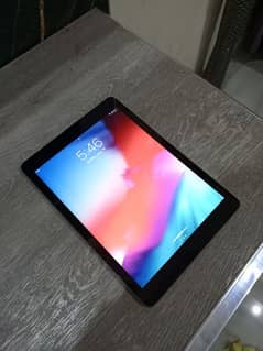 Apple Ipad Air 2 with Book Cover