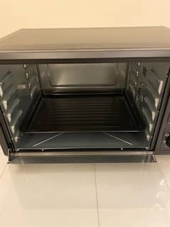 selling brand new just open oven