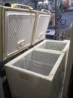 A freezer in used condition compressor geniun