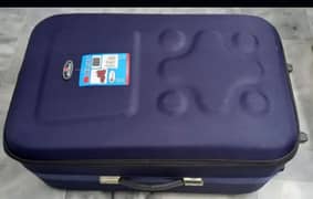 medium size navy blue colour travel trolley bag