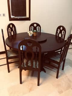 Round-shape dining table with revolving center top & 6 chairs in E-11 0