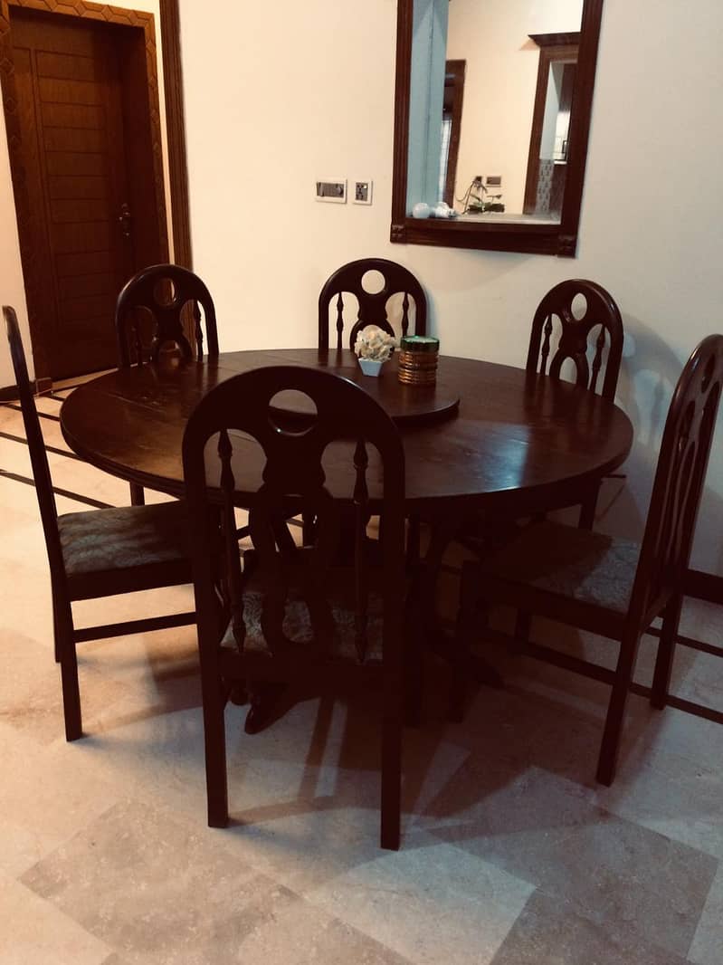 Round-shape dining table with revolving center top & 6 chairs in E-11 11