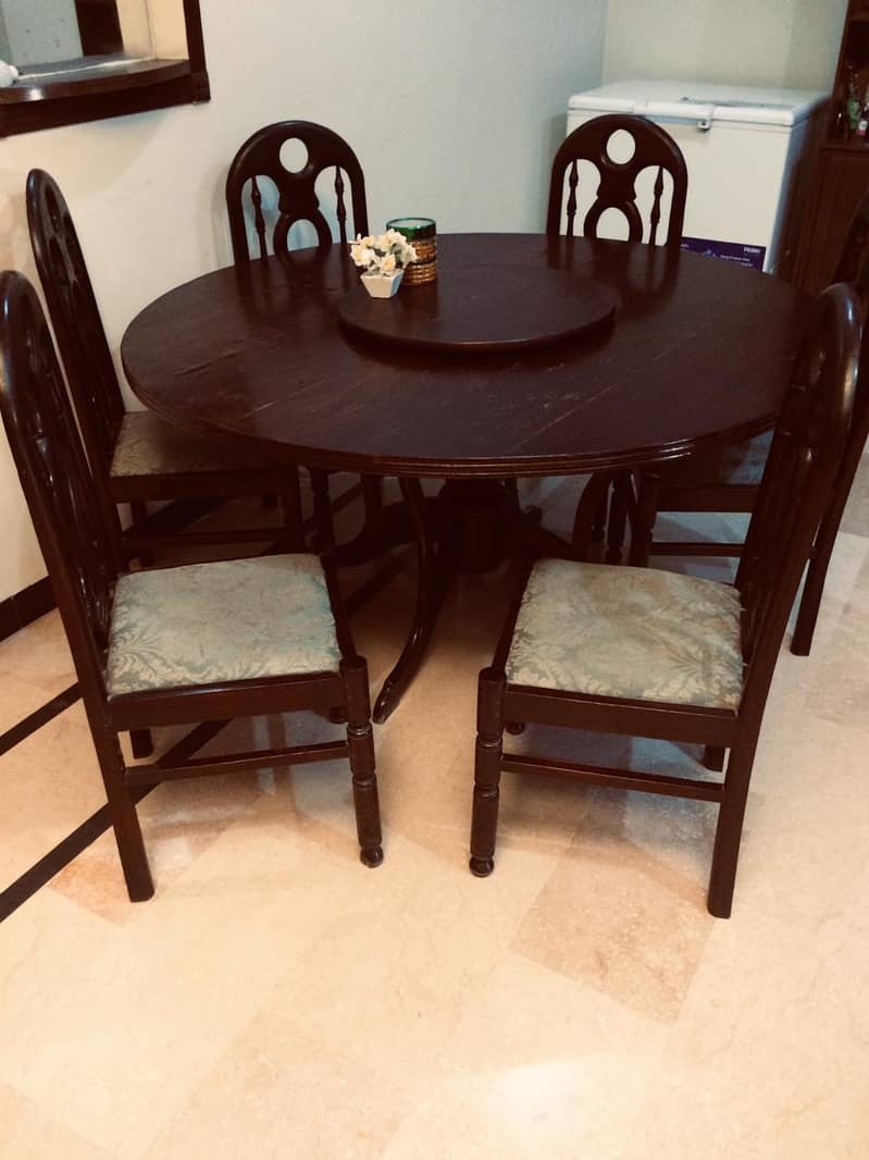 Round-shape dining table with revolving center top & 6 chairs in E-11 14