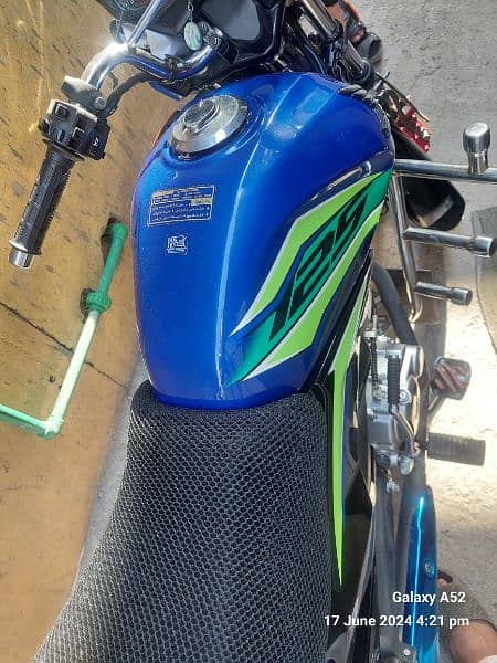 Honda cb 125f 2023 blue colour Islamabad number ten by ten life time 7