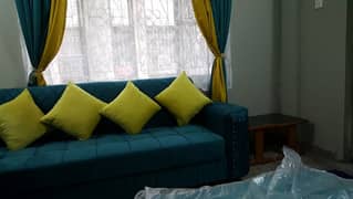 Sofa set with table and curtains
