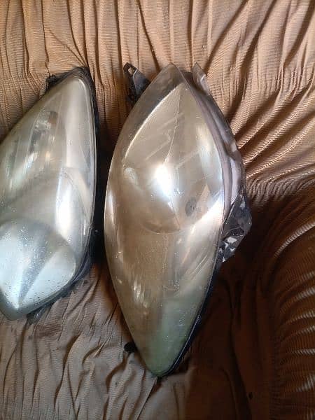 toyota vitz 2007 head lights 0