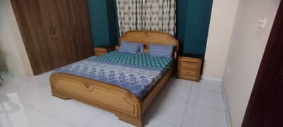 King Bed, Mattress, Dresser and two Side tables.