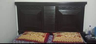 double bed with two side tables