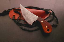 Custom handmade damascus steel skinning knife with leather sheath