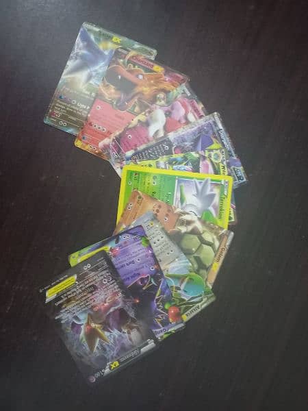 10 ultra rare pokemon cards all good condition and real with charizard 1