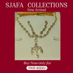 Zircon golden necklace set by Sjafa Collections