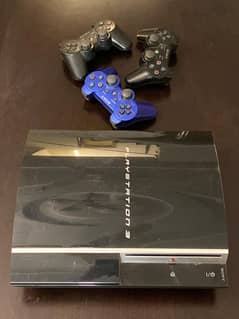 PS3 with two controllers and 15 games 0