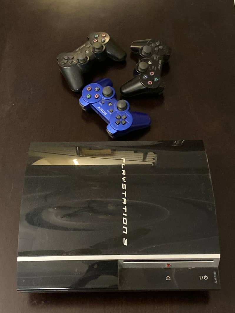 PS3 with two controllers and 15 games 4