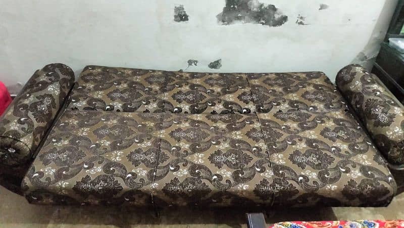 Three seaters sofa cum bed better condition made in molty foam 2