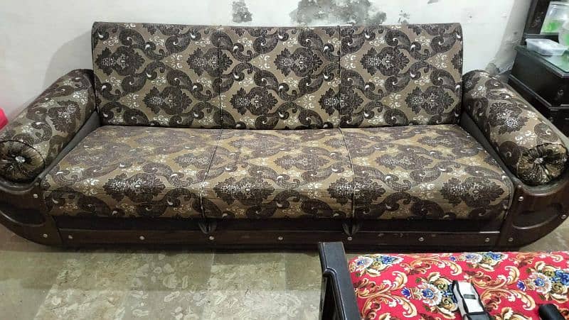 Three seaters sofa cum bed better condition made in molty foam 4