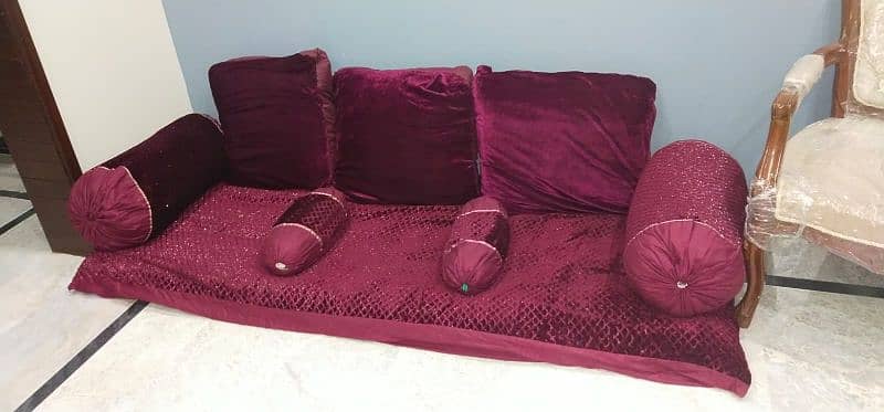 floor sitting couches along with round pillows 1