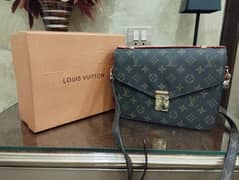 Louis Vuitton pochette métis hand bag