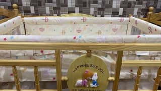 wooden solid baby cot available