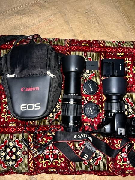 canon d1300 camera with two landed 0