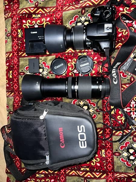 canon d1300 camera with two landed 2