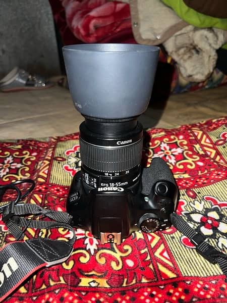 canon d1300 camera with two landed 7