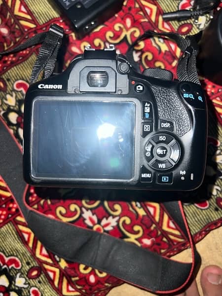 canon d1300 camera with two landed 11