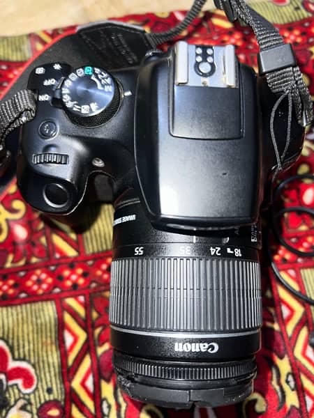 canon d1300 camera with two landed 15