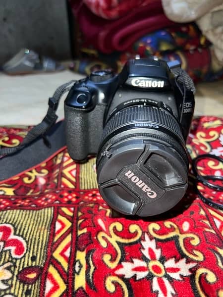 canon d1300 camera with two landed 16