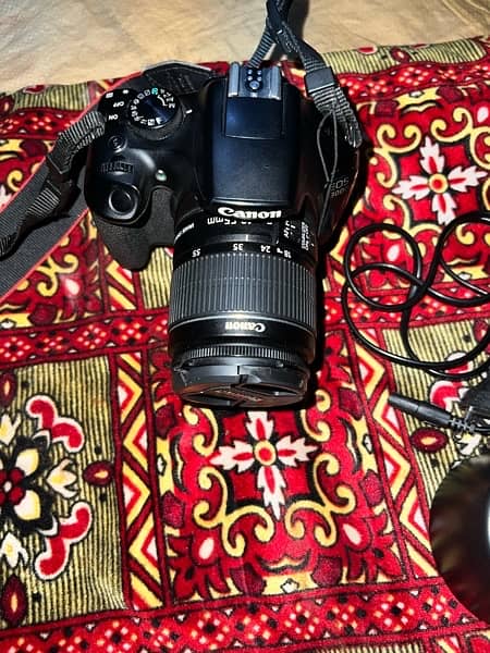 canon d1300 camera with two landed 17