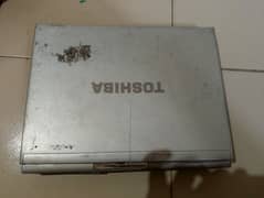 toshiba core 2 duo laptop is on, selling by parts, read ad first