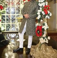 Black sherwani by Amir Adnan Only sherwani