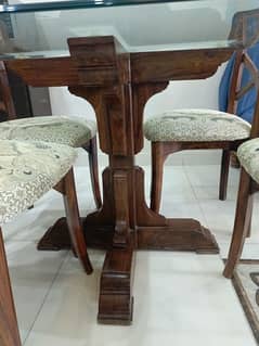 dining table 4 chairs good condition and center table