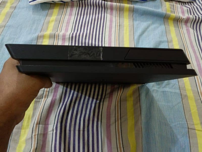 PS4 Slim 2-TB with One Original Controller 5
