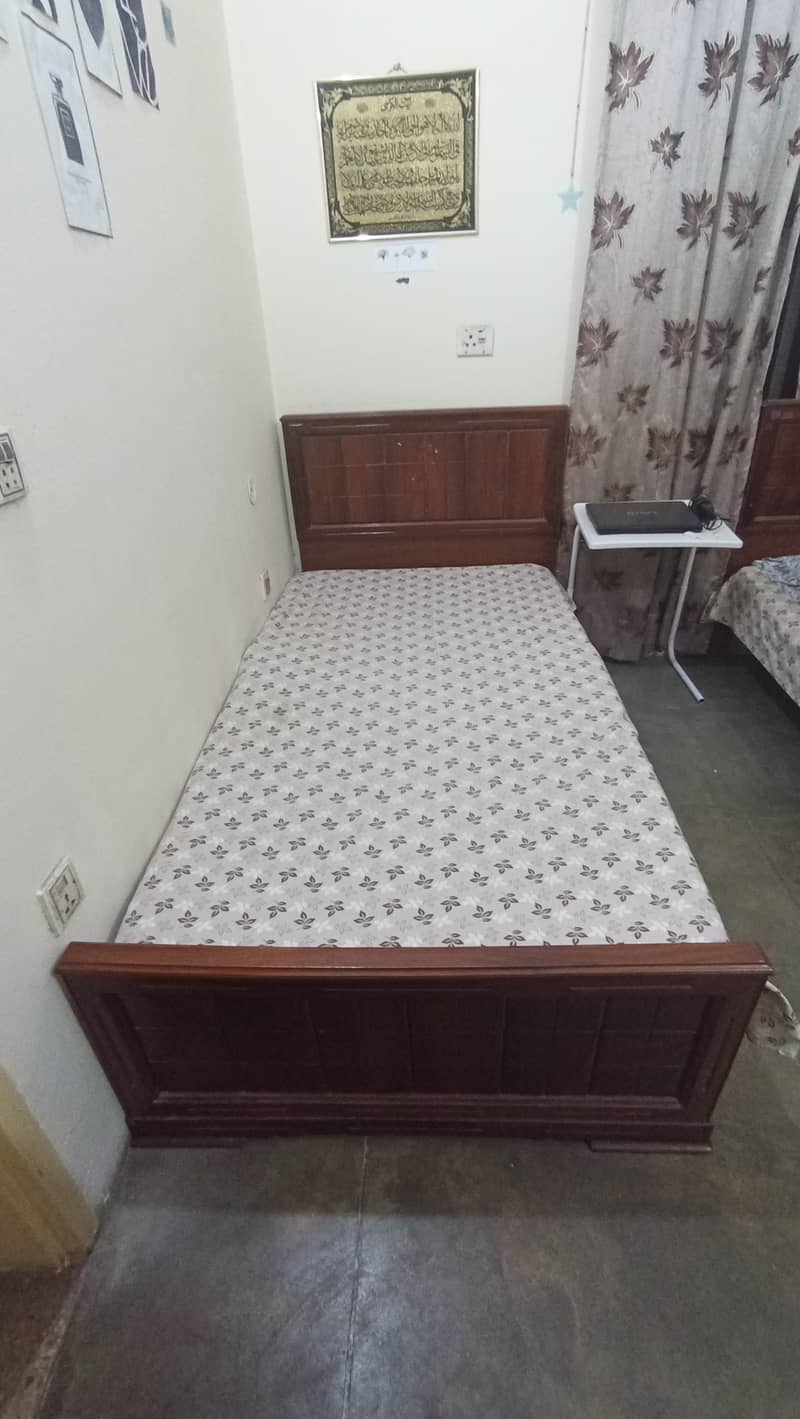 Wooden single beds with mattress (2 nos) 2