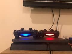 Ps4 slim with 2 controllers (original ) and 3 games