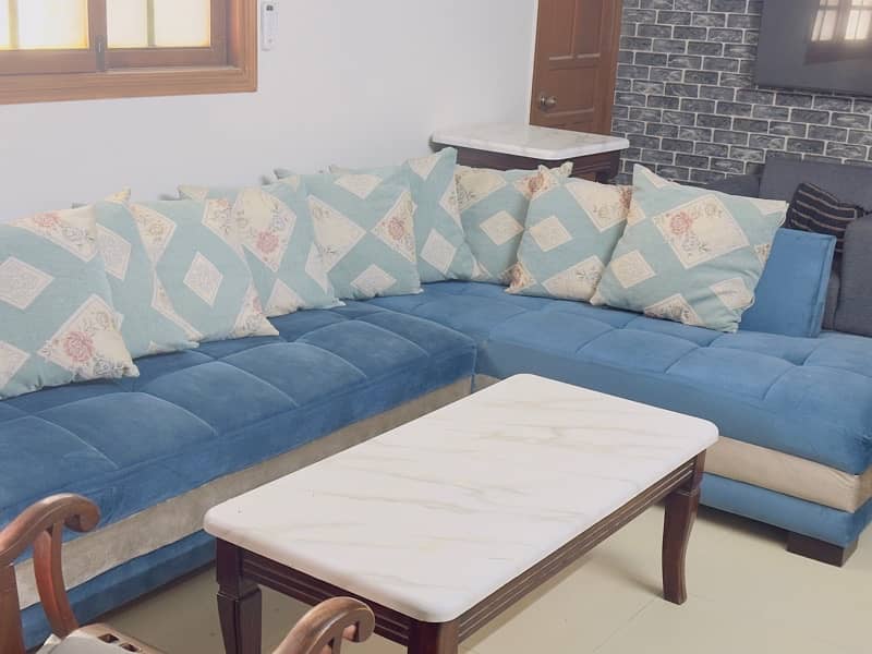 L SHAPED SOFA IN BLUE AND GREY 0