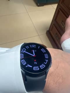 Samsung Galaxy Watch 4 with box and charging cable