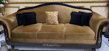 6 seater sofa slightly used in golden colour with cushions