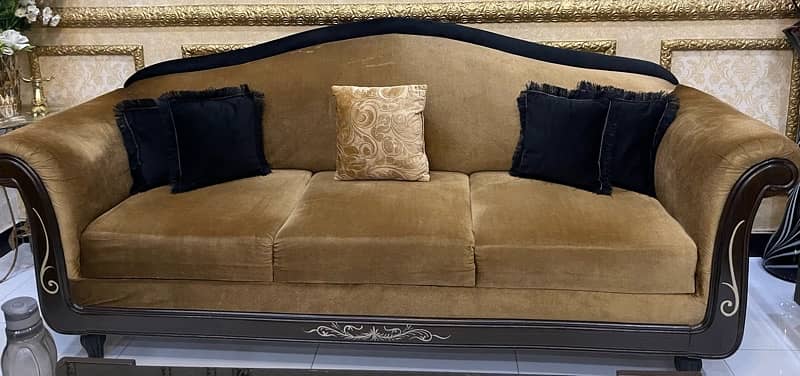 6 seater sofa slightly used in golden colour with cushions 0
