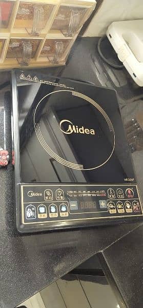 Midea electric stove induction cooker imported with 2 Induction Pans 1