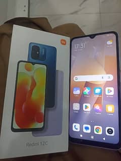 redmi 12c 4 GB 128 GB with 5 month warranty complete box chrger ka sat