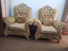 7 seaters sofa set with cushions and wooden center table