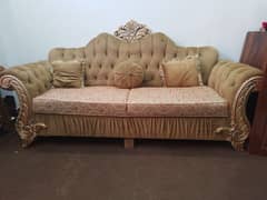 7 seaters sofa set with cushions and wooden center table