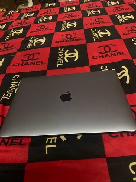 apple Mac book pro with touch panel and finger sensor 0