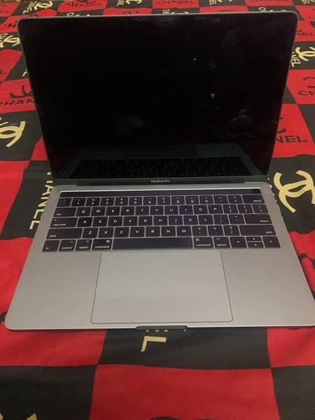 apple Mac book pro with touch panel and finger sensor 1